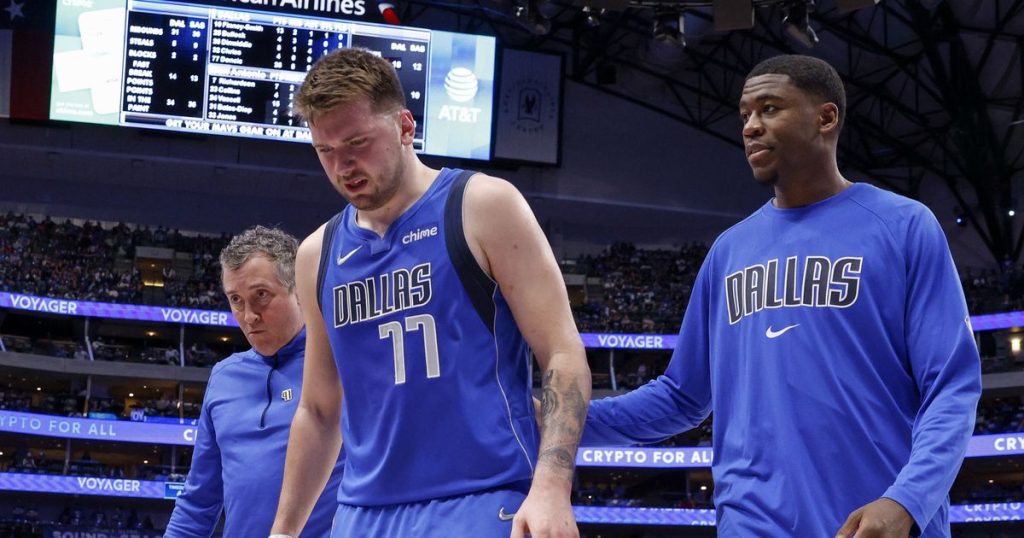 Dallas Mavericks guard Luka Doncic (77) reacts to foul call during the first quarter of an...