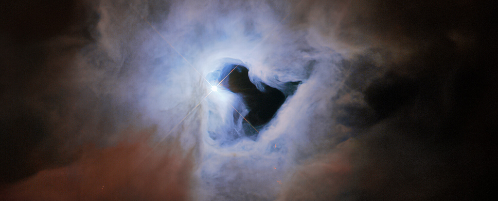 Teleskop Hubble'a znalazł „kosmiczną dziurkę od klucza” głęboko w kosmosie i jesteśmy zachwyceni: ScienceAlert