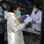 Chiny zmagają się z infekcją COVID po złagodzeniu kontroli